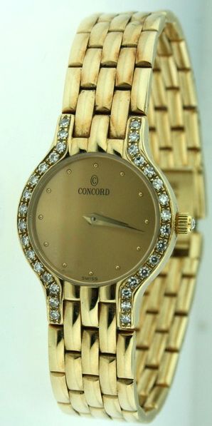 Concord 14k Yellow Gold Diamond Ladies Watch.  