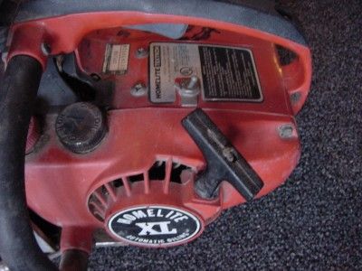   POWERED PORTABLE CHAINSAW WINCH + HOMELITE CHAIN SAW LEWIS RULE  