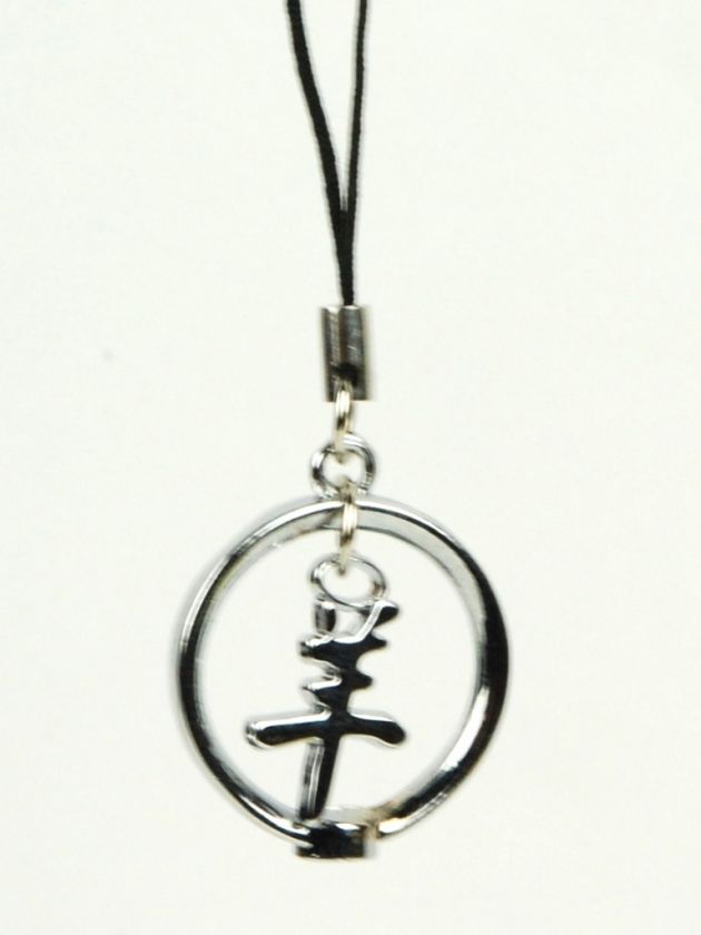   coin features the chinese character for goat the charm is perfect